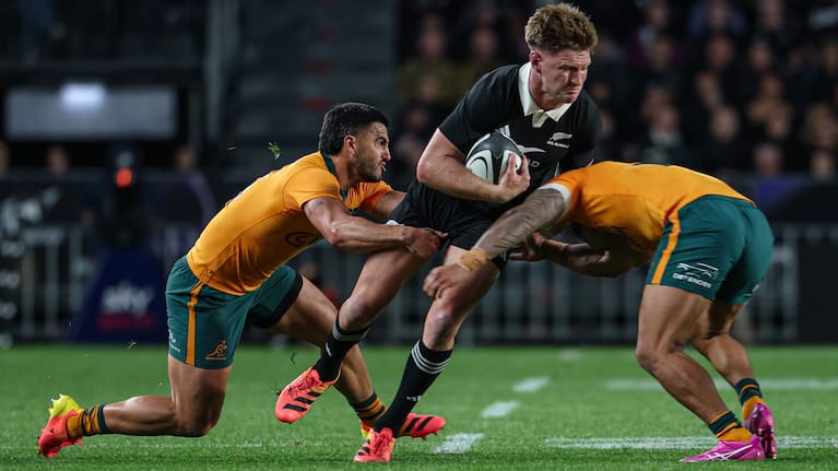 All Blacks centre Jordie Barrett carries the ball against the Wallabies.