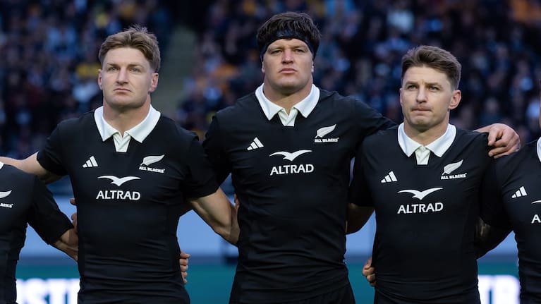 Jordie, Scott and Beauden Barrett during the national anthems before the Bledisloe Cup opener at Eden Park.