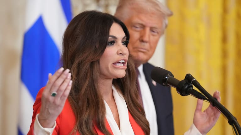 Kimberly Guilfoyle speaks as President Donald Trump listens at a reception celebrating Greek Independence Day in the East Room of the White House.