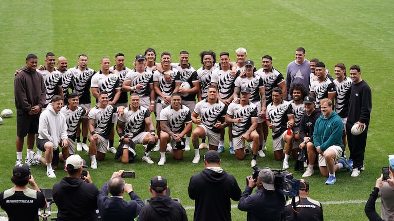 Kiwis players pose for a photo with members of the All Blacks squad