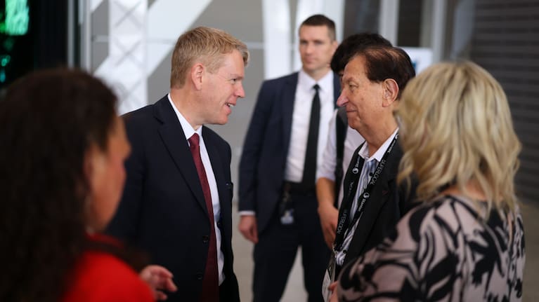 Labour leader Chris Hipkins talking to Rotorua councillor Trevor Maxwell at the LGNZ SuperLocal Conference in Rotorua.