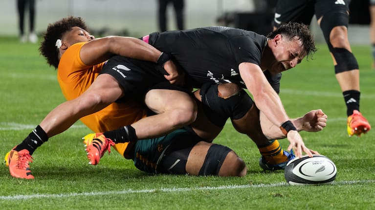 Leroy Carter of New Zealand scoring a try against the Wallabies.