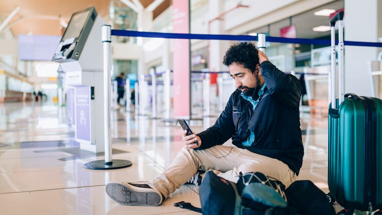 Stressed man after his flight was disrupted File image). 