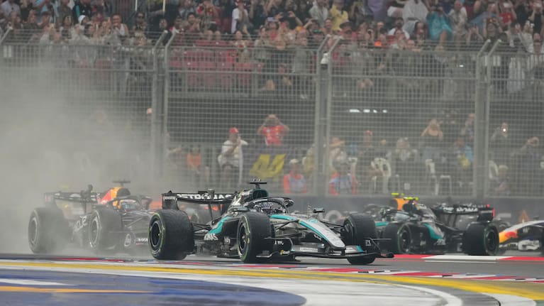Mercedes driver George Russell of Britain steers his car ahead of others during the sprint race ahead of the Singapore Formula One Grand Prix in Singapore.