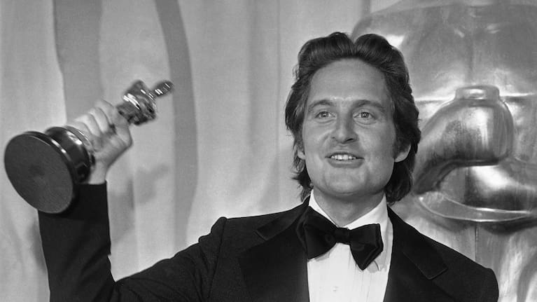 Michael Douglas, co-producer of the film One Flew Over the Cuckoo's Nest, holds the Oscar he won by the picture at the Academy Awards in 1976.