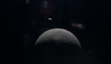 A view of the moon with the Earth in the background