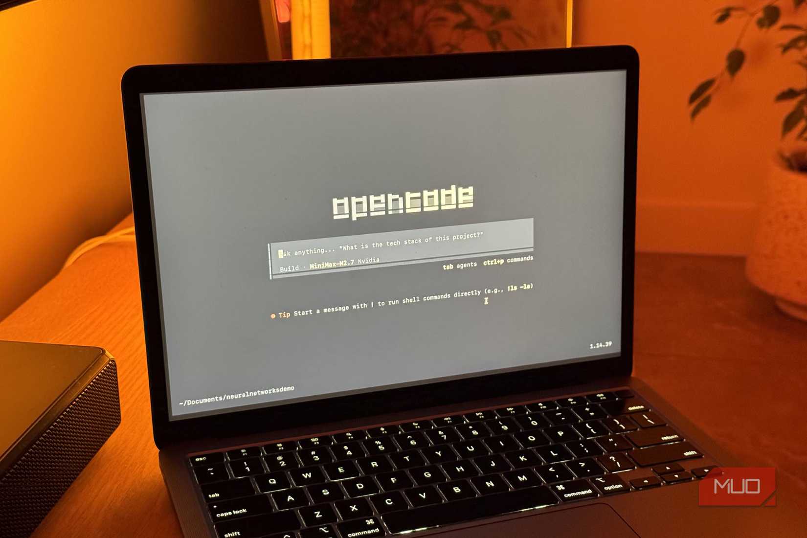 OpenCode open on a MacBook