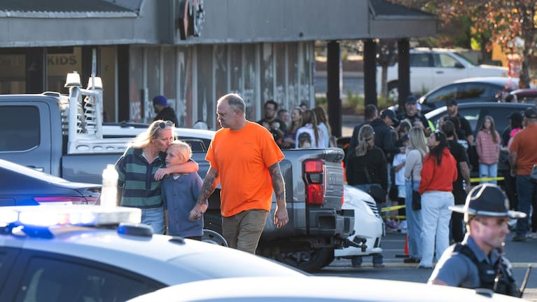 People leave a family meeting area following a shooting at Silver Rail Elementary School, Thursday, October 15, 2026, in Bend, Oregon. 