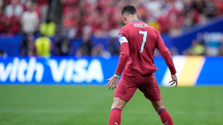 Portugal's Cristiano Ronaldo celebrates after scoring the opening goal during the World Cup Group K match between Portugal and Uzbekistan in Houston.