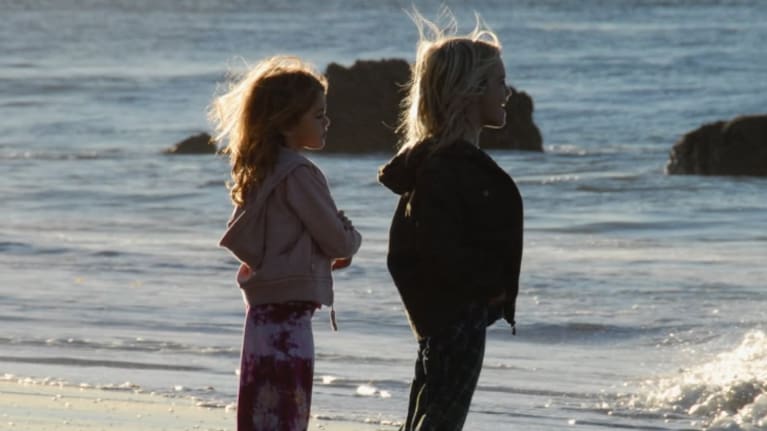 Presley Gerber (right) with sister Kaia Gerber as children.