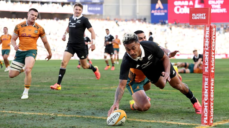 Rieko Ioane of the All Blacks scores a try against the Wallabies at Accor Stadium in Sydney.