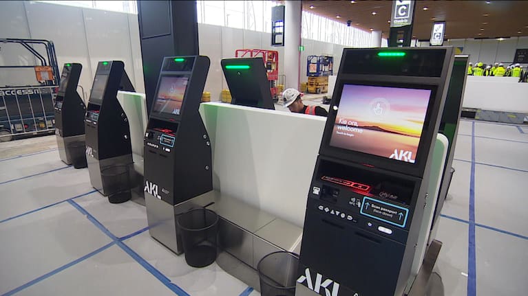 Self-service kiosks at Auckland Airport.