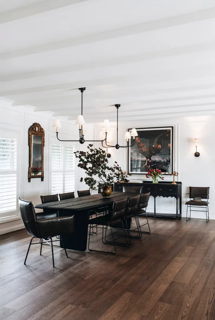 A white modern country-style dining room with black furnishings