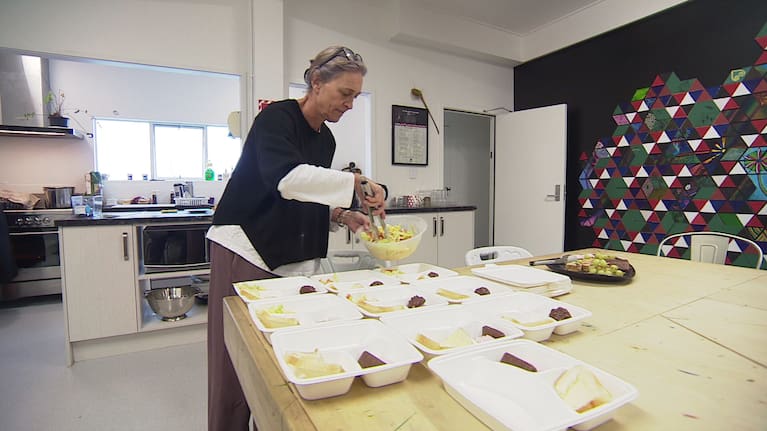 Te Whare o Tapatahi staff dishes out kai packs to deliver to rough sleepers and those in need.