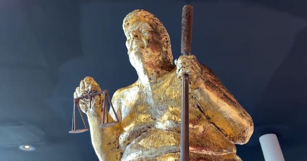 Naked, golden Trump statue goes on display at European Parliament
