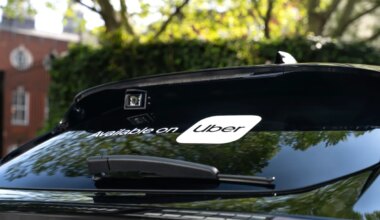 Uber sticker on rear of car