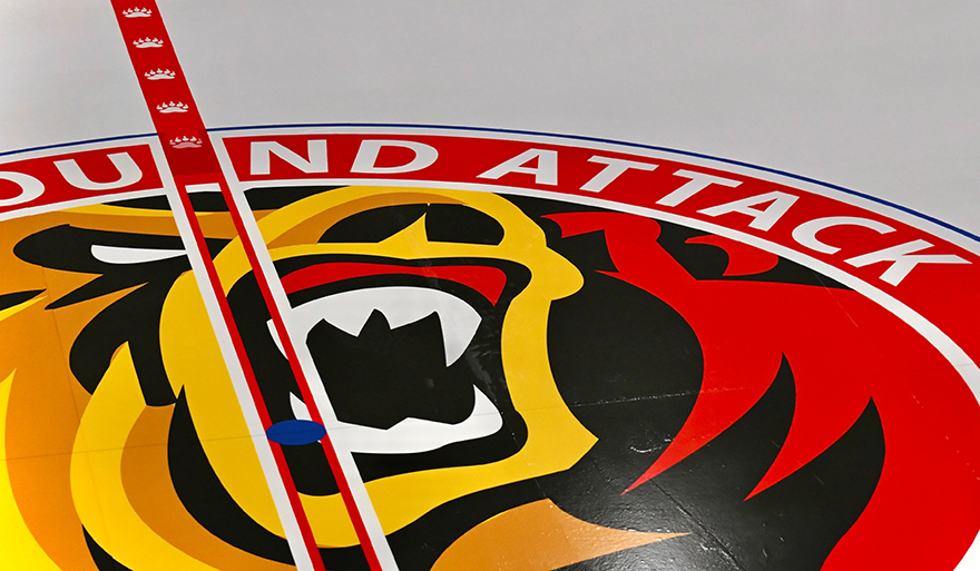 The Owen Sound Attack logo painted on the ice inside the Harry Lumley Bayshore Community Centre.