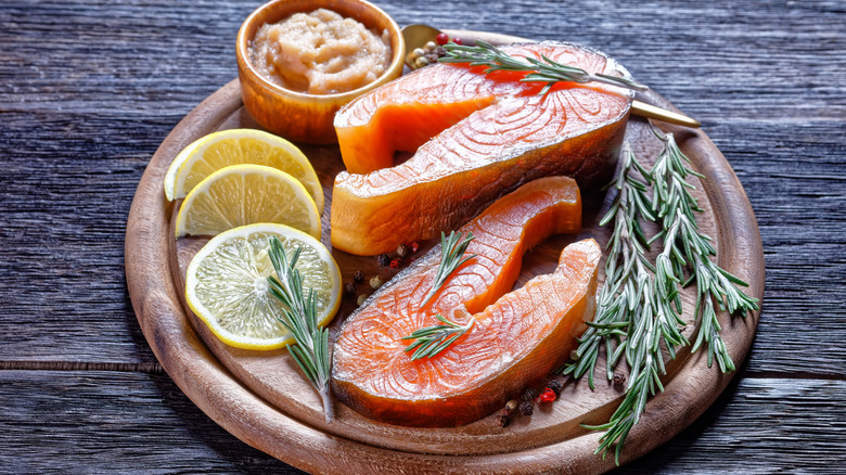 Raw Arctic char steaks.