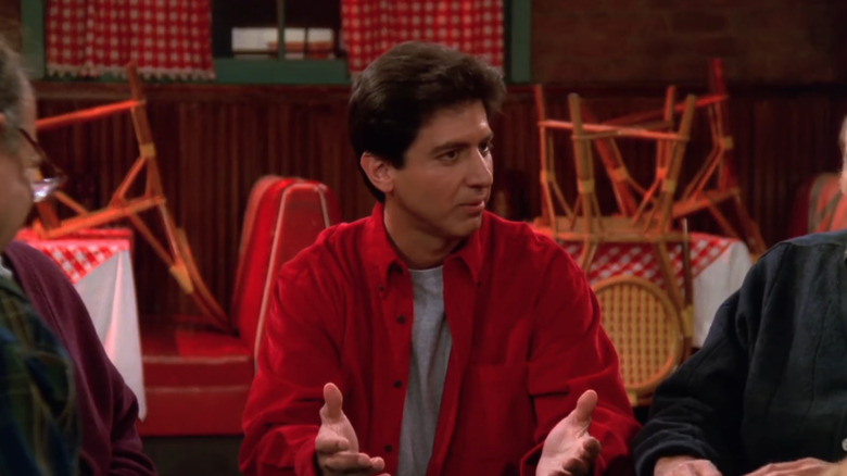 Ray Romano as Ray Barone holds out his hands on Everybody Loves Raymond