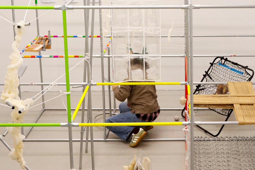 metal pipe grid transforms personal rituals of control into participatory playground - 3