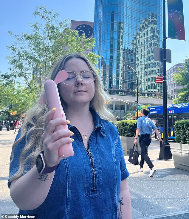 Me in the sweltering New York City summer featuring my trusty battery-powered fan that I take on the subway (and everywhere else)