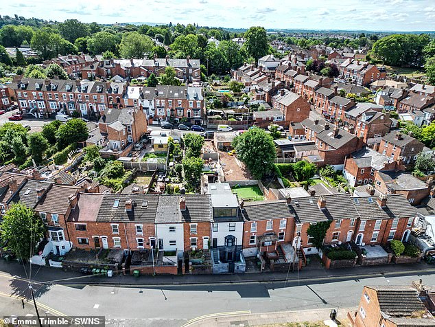 Mrs Hussain, who owns a newsagents in the city, said she didn't 'know anything' about the planning application being rejected, adding: 'I don't think it looks too big'