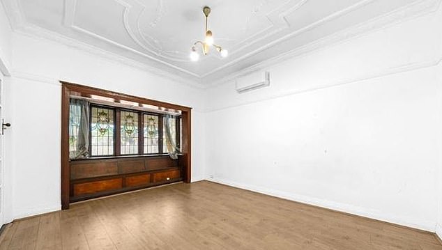 Surrounded by sleek high-rise towers, the freestanding cottage was the final holdout on a street transformed by development