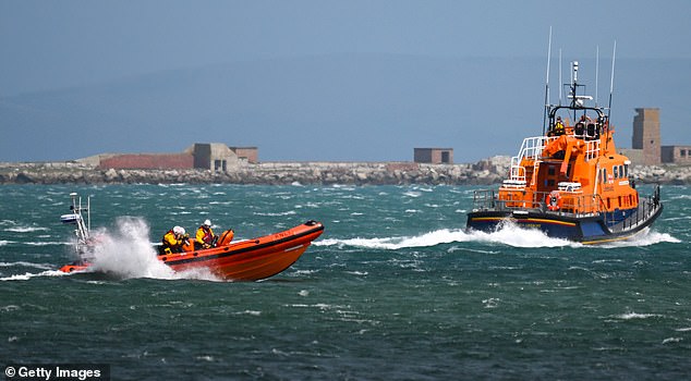 The ILB crew arrived on scene to find the kite surfer being recovered from the water by the Portland harbour patrol boat