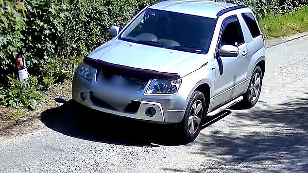 The CCTV footage shows a man throwing an egg custard carton from his vehicle on a country lane in the St Austell area