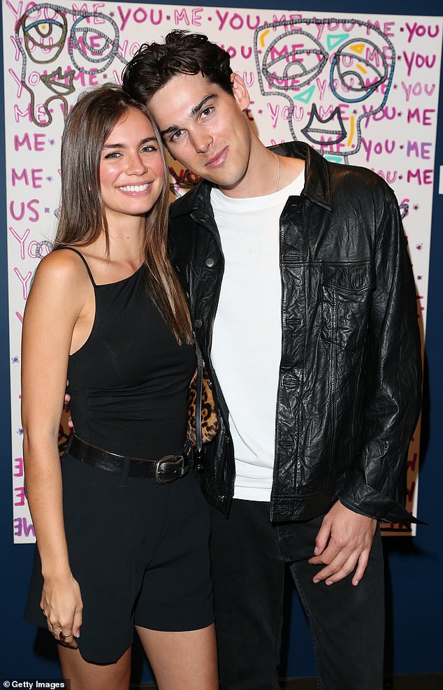 Paris Brosnan and his girlfriend Alex Lee-Aillon at his exhibition launch
