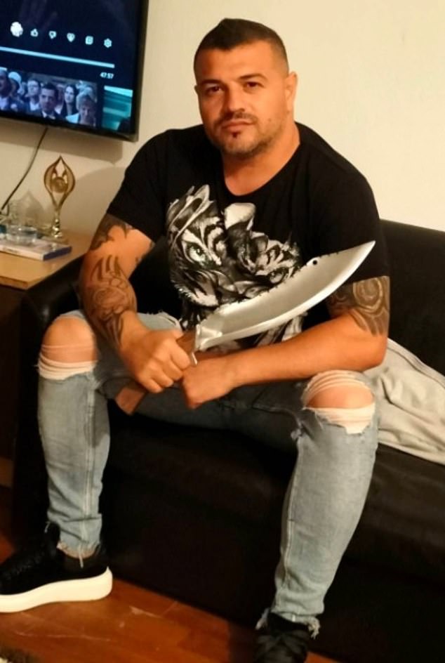 Aurel Mezei - a heavily tattooed 44-year-old from the northern Romanian city of Baia Mare, inherited Eileen Holland's home