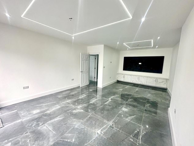 The rear of the house was extended with sharp, boxy lines that bore no relation to the original structure