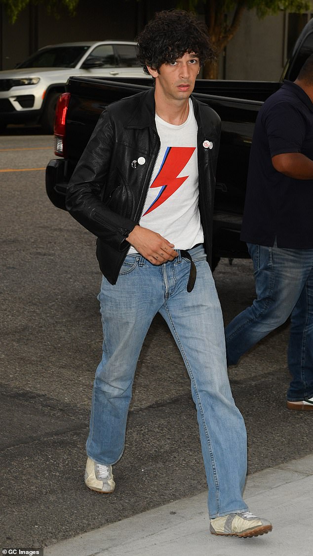 However frontman Matty Healy was noticeably absent (pictured in Los Angeles on Friday)