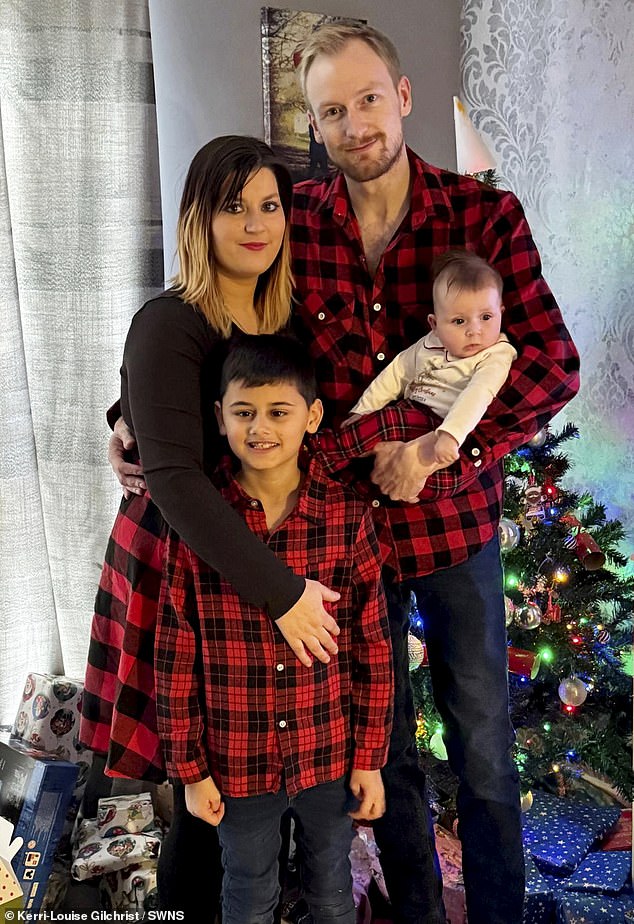 Ms Gilchrist lost 2885ml, more than five pints, of blood. Having sat with her feet in stilts for three hours as she waited doctors to remove her placenta, she ultimately required two blood transfusions to save her life (Pictured: Ms Gilchrist and Mr Marshall with their two children - Teddy, eight, and Layla, 11 months