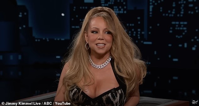 Beaming, Mariah replied: 'Not really, sometimes on someone's arm or something, but that was a unique moment. Yes, we love Rihanna'