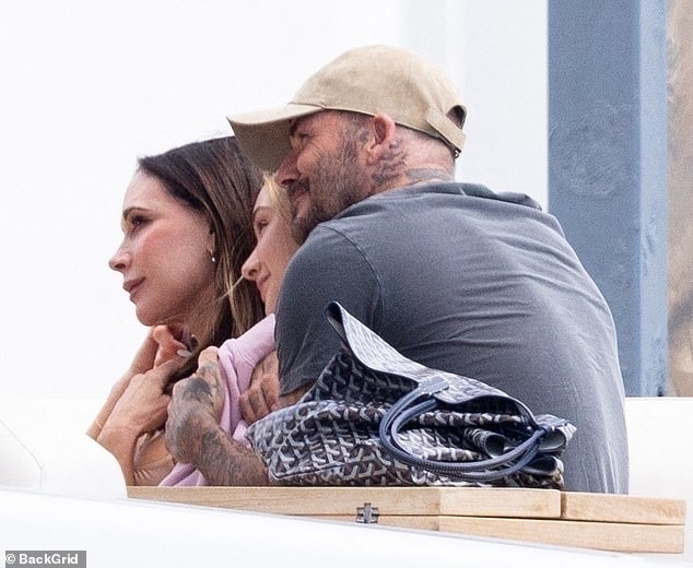 David and Victoria Beckham (pictured with daughter Harper) narrowly avoided an awkward run-in with their estranged son and his wife in St Tropez last week