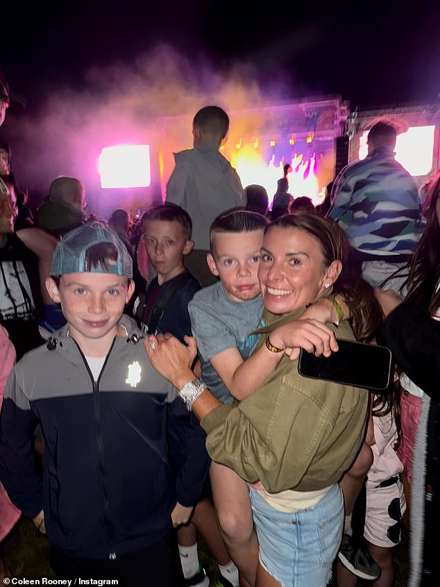 The WAG, 38, and three of her children Klay, 11, Kit, eight, and Cass, six, joined the crowd at the event held at Bolesworth Castle in Cheshire