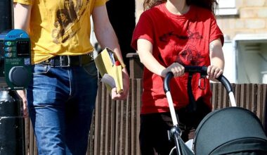 Michael Hutchence's daughter Tiger Lily Hutchence looked like the proud mother as she took her newborn on a family stroll in London on Monday. Pictured Tiger Lily and husband Ben