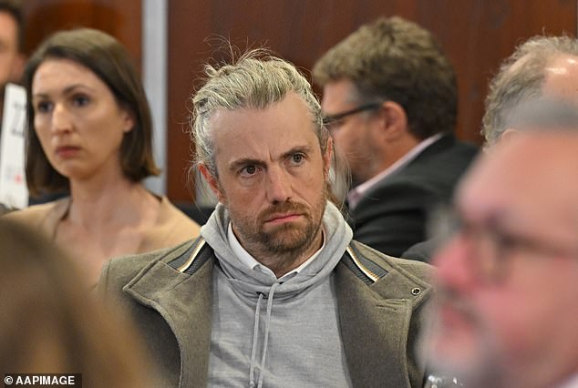 Mike Cannon-Brookes looked tense as he watched his co-founder speak about the benefits of AI