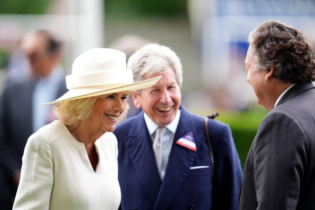 Queen Camilla speaking with John Warren and Sir Francis Brooke at Ascot