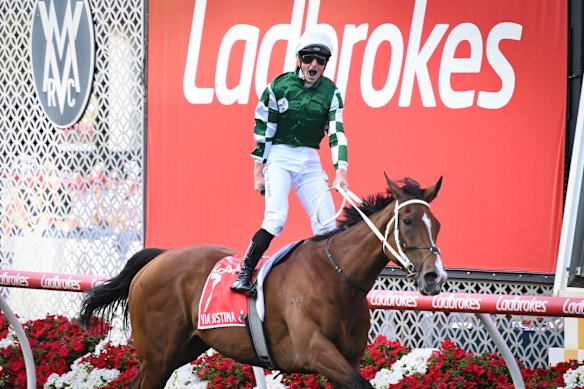 James McDonald and Via Sistina win the 2024 Cox Plate in front of Moonee Valley’s Ladbroke signage.
