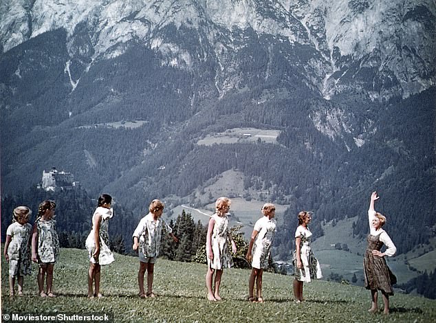 The cast are pictured while filming in Austria in 1965. Kym gushed about the surviving groups enduring friendship in 2022, declaring: 'We're beyond friends. We're second family'