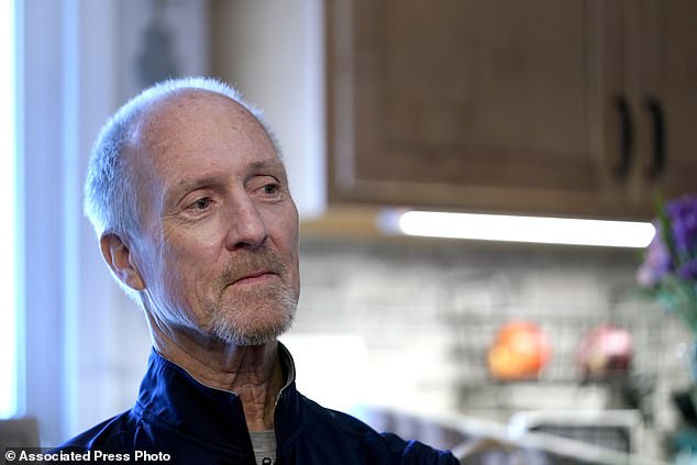 Jim Gaffney sits with fellow activists while discussing nuclear contamination. Gaffney, now in his 60s, grew up in the 1960s playing in Coldwater Creek. His childhood home backed onto it