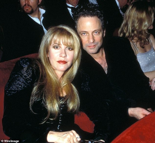 Nicks was romantically linked to Buckingham, Fleetwood Mac's lead guitarist and co-lead vocalist, from 1972 to 1976. Pictured in 1998