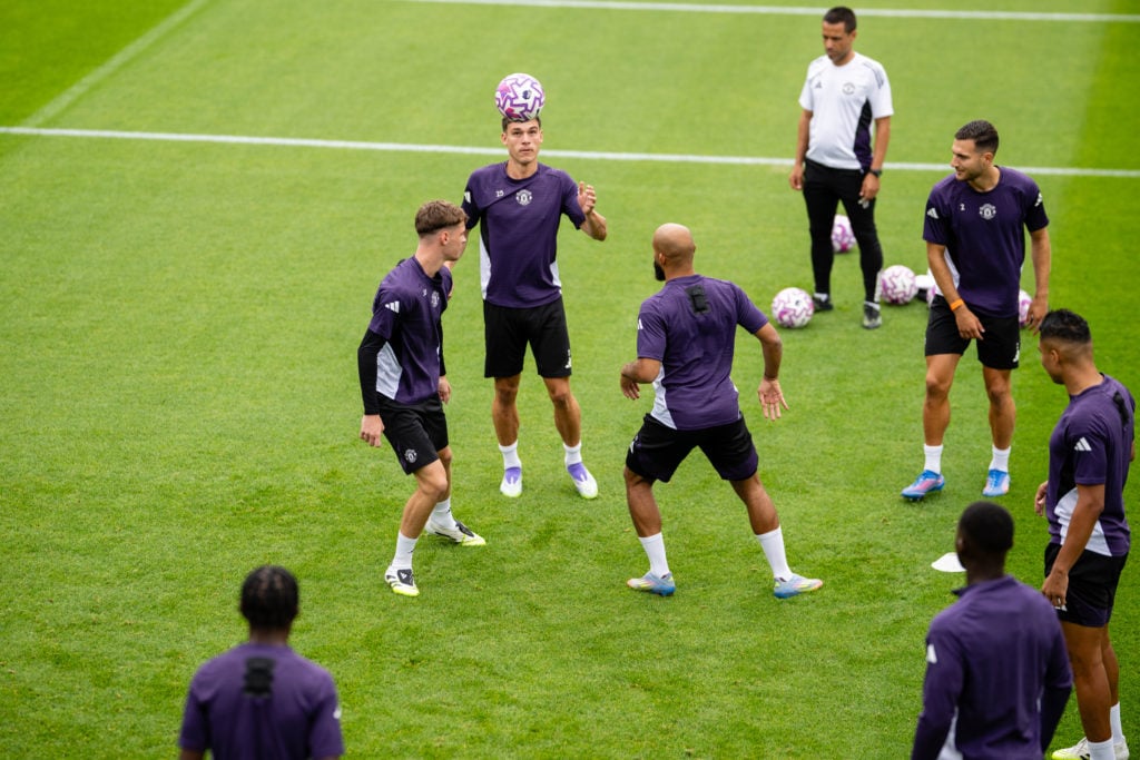 Manuel Ugarte, Diogo Dalot, Bryan Mbeumo of Manchester United in action during a first team training session at Carrington Training Ground on July 22, 2025