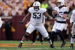FILE - Penn State offensive lineman Nick Dawkins (53) in action during the first half of an NCAA college football game against Minnesota, Nov. 23, 2024, in Minneapolis.