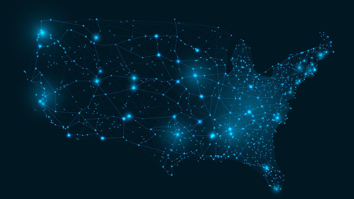 map of the United States made of glowing points of light on black