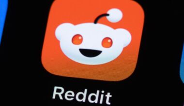 A Reddit app icon on a phone screen.