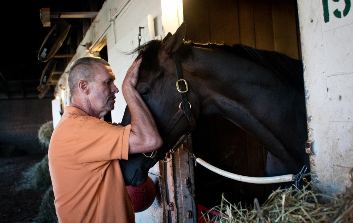 Garry Simms Sr. at his Churchill Downs barn in 2011. Photo courtesy of Louisville Courier-Journal.