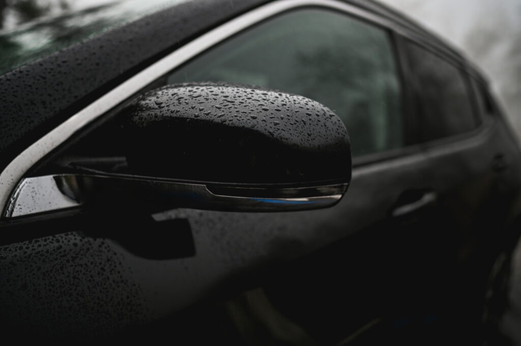 close up of wet car details.